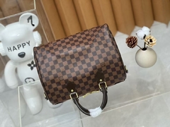 Bolsa baú Louis Vuitton - Elegância e Você