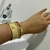 Bracelete fio torcido detalhe de esfera - comprar online