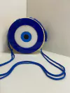 Bolsa de Palha, Olho Grego P