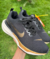 Nike zoom preto e dourado