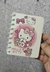 Caderneta espiral pautado Hello kitty