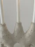 Candelabro Om 3 velas en internet