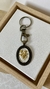 Chaveiro oval - flor de ouro
