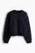 Buzo con botones en hombro - H&M