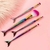 Set de 4 brochas de maquillaje con forma de cola de sirena.