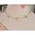 Imagem do Pulseira/Colar Flores Banhada em Ouro 18k