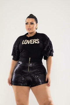 Imagem do Blusa em Malha Slink com Mangas em Paetê e Aplique Frontal uma peça única que combina elegância e modernidade em Tamanho Único (46-52)
