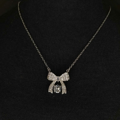 collar dije moño con strass dorado y plateado en internet