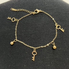 Pulsera acero quirúrgico con llave elegir color - comprar online