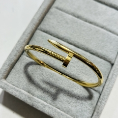 Pulsera esclava clavo acero dorado