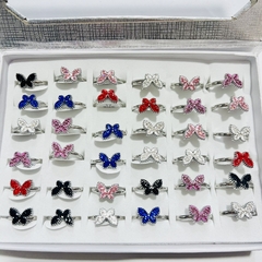 Anillo acero quirúrgico con mariposa strass caja x36