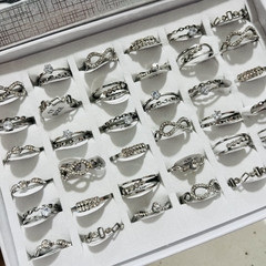 Anillo acero quirúrgico surtido strass caja x36