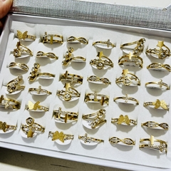 Anillo acero dorado surtidos caja x36