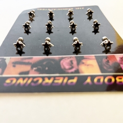 Piercing estrella pack x12 pcs acero quirúrgico