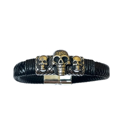 Pulsera cuerina con 3 calaveras acero quirúrgico magnetica