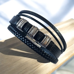 Pulsera cuerina magnética con dijes
