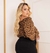 Cropped onça plus size na internet