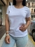 Remera blanca aplique brillo plateado