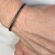 Bracelete Aço Trançado Grafite Metálico na internet