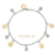 Pulseira De Aço Com Flor Dourada/Bolinha & Coração - comprar online