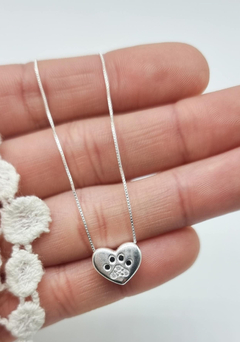 Cadena con dije huellitas