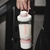 Imagen de Botella de batido Youcanplato 620 ML Rosa con compartimento