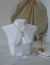 Conjunto de Brincos e Colar