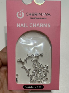 Dijes metalizados mariposas y moños Cherimoya - tienda online