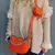 Bandolera Daisy Naranja en internet
