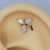 Labret catavento zircônia com trava titânio pvd gold TN0165