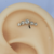 Labret cluster 5 pedras aço pvd gold A0267