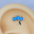 Labret Cluster três opalas azul com garra Titânio TN0499