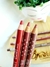 Lápis de boca Ultra Easy na cor Ruby Kisses, mostrando três lápis labiais de diferentes tonalidades em um fundo neutro.