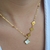 Colar Dourado 4 Trevos Branco Aço Inoxidável - comprar online