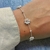 Pulseira Flores Pérolas Prata - comprar online