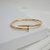 Bracelete Dourado Prego Aço Inoxidável - comprar online