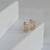 Brinco Dourado Argola T Insp. Crav. na internet