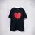 REMERA OVER L’AMOUR NEGRA - PERRO SALCHICHA