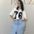 T-SHIRTS OVER ESTAMPADA na internet
