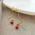 EARCUFF CADENA CRISTAL ROJO