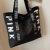 CARTERA PINK NEGRA