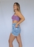 Short celeste con roturas
