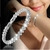 Pulseira de Cristais Luxuosa com Acabamento Prateado