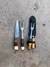 Juego de cuchillo y tenedor en vaina.