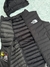 Chaleco TNF con capucha