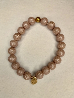 Pulsera piedras volcánicas con relieve en tonos rosa viejo