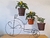 Base para macetas con forma de bicicleta. - comprar en línea