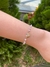 Pulseira pérolas com coração cravejado