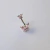 Pink Butterfly Navel Piercing en internet