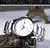 Relógio Curren masculino com design minimalista e pulseira de metal prateada, mostrador branco com marcadores finos e calendário